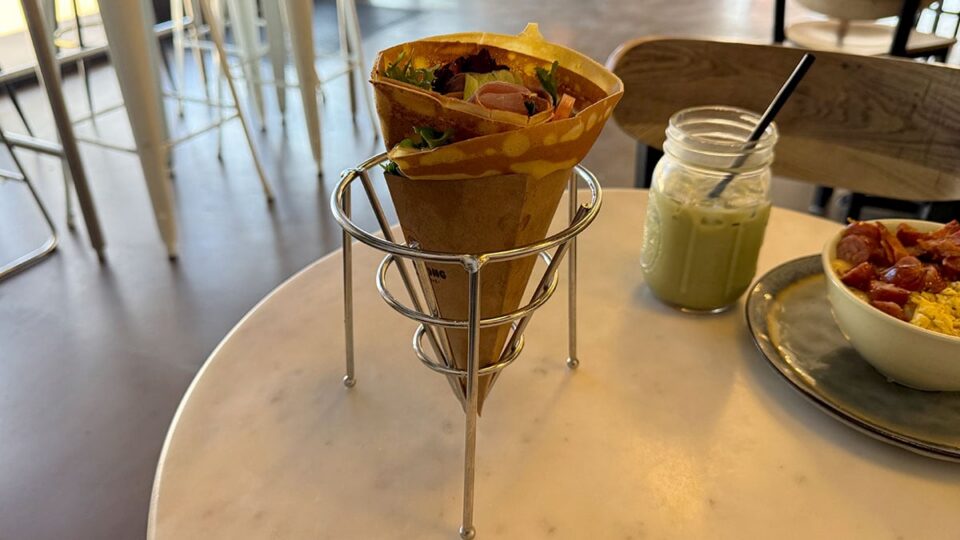 Salmon lox savory crepe with spring mix, tomato, onion, and Dijon mayo at Cafe Mong.