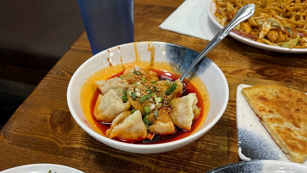 spicy dumplings served with a sweet and spicy sauce at The Magic Noodle Las Vegas.