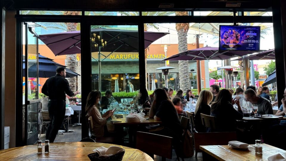 Interior view of Grape Street Wine Bar looking out toward the patio seating area