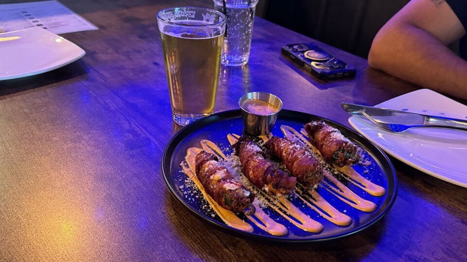 Bacon wrapped jalapeño poppers served at Evolve Brewing Project.
