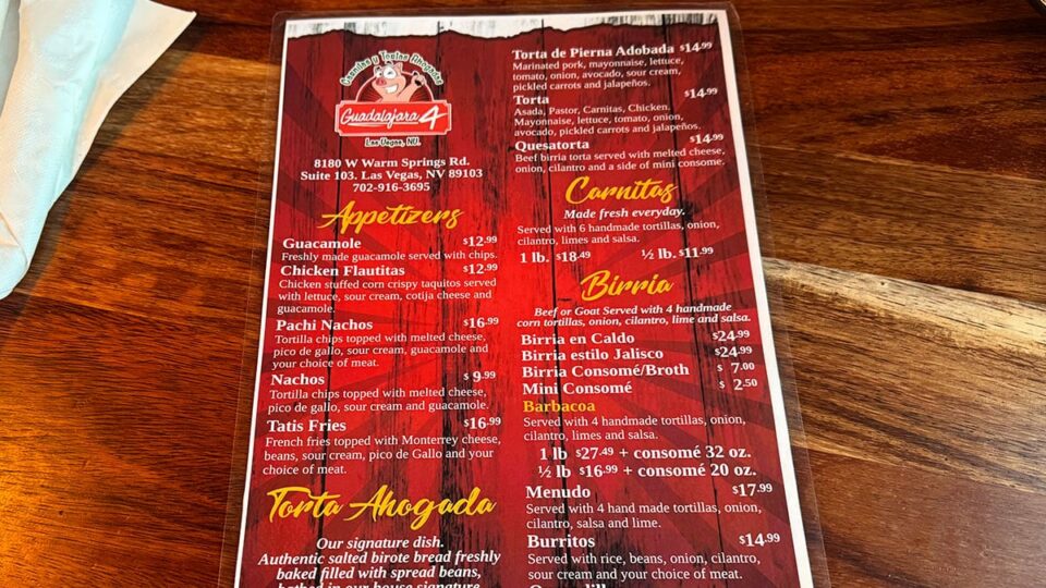 Menu board at Carnitas y Tortas Ahogadas Guadalajara 4 showing tacos and tortas options
