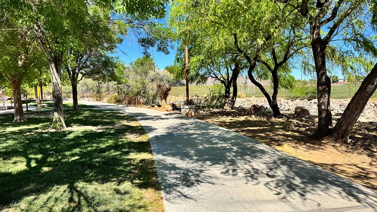 walking path at Centennial Hills Park with trees and open space
