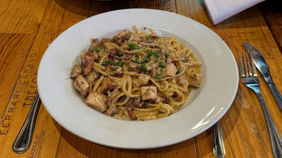 Linguine chicken carbonara with bacon, sausage, and creamy sauce at Grape Street Wine Bar