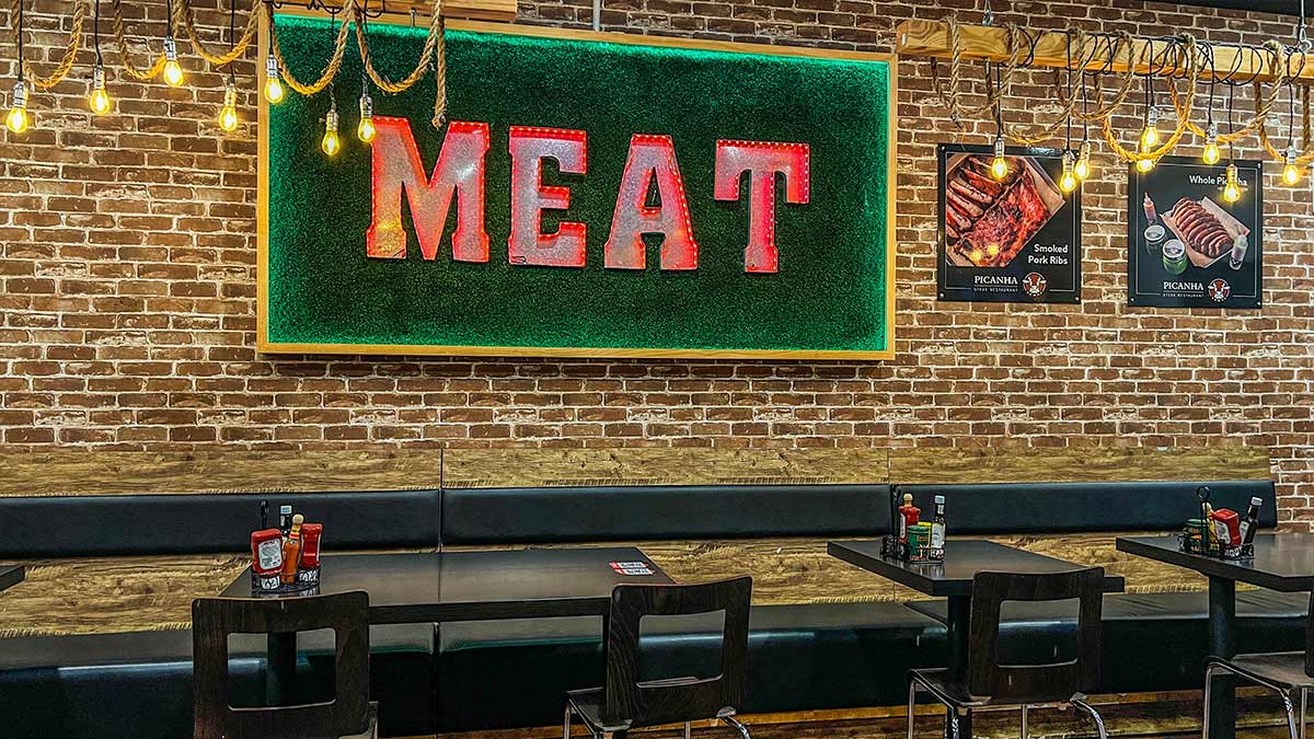 Meat Sign And Seating Picanha Steak Restaurant
