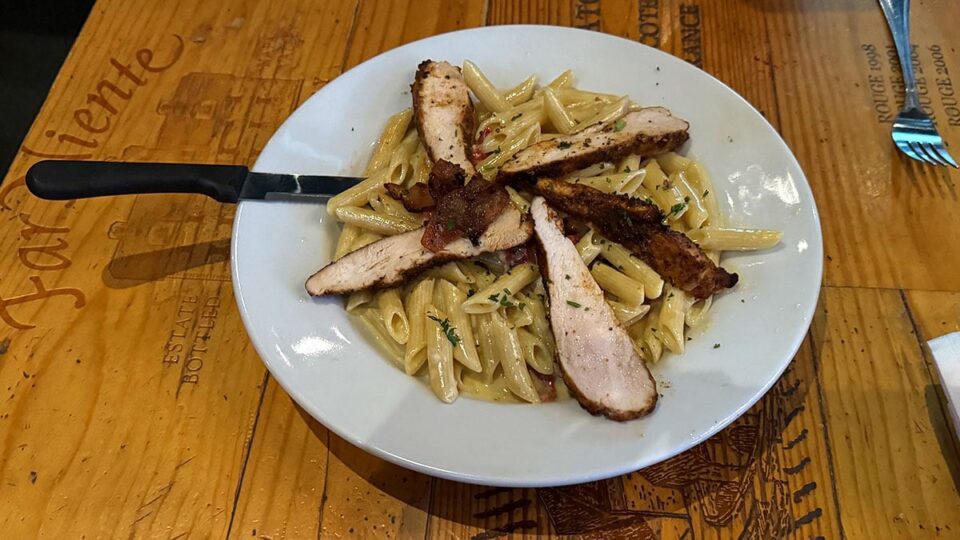 Penne chicken gorgonzola with roasted red peppers and creamy sauce at Grape Street