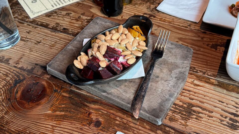 Warm beet salad with goat cheese and almonds served at Settebello