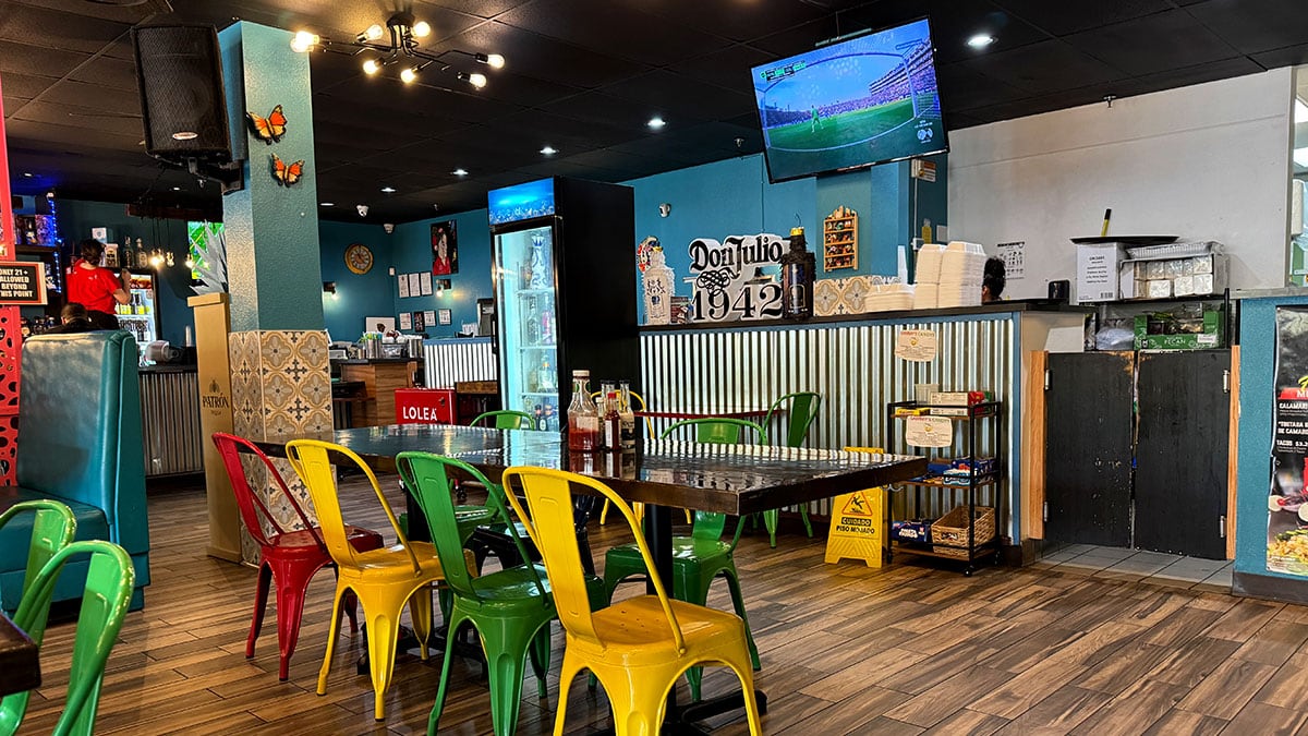 interior dining area at chile caliente with colorful mexican decor