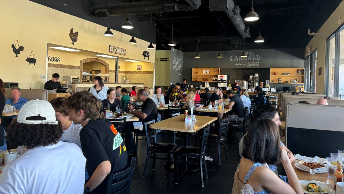 interior dining area at The Cracked Egg with tables and seating