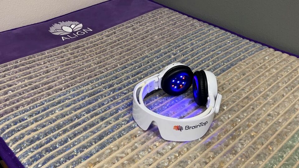 BrainTap headphones placed on an AlignMat wellness system at Desert Moon Wellness in Las Vegas