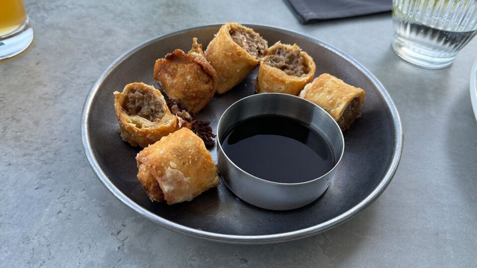 Cheesesteak eggrolls appetizer served at Butcher & Thief restaurant