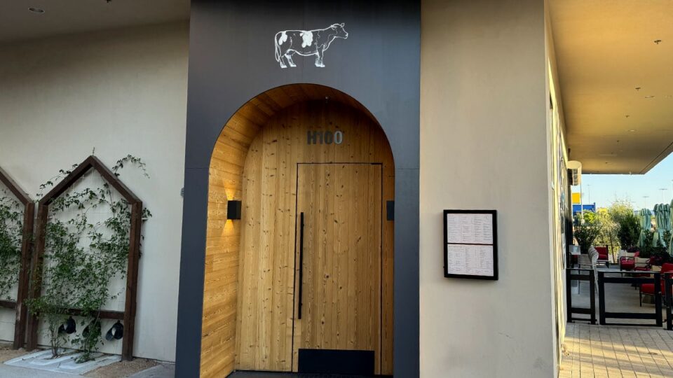 Wooden front entrance doors at Butcher & Thief in Las Vegas