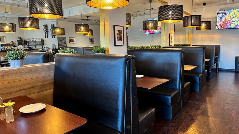 interior dining area inside Thai Street Cafe showing spacious seating and modern decor