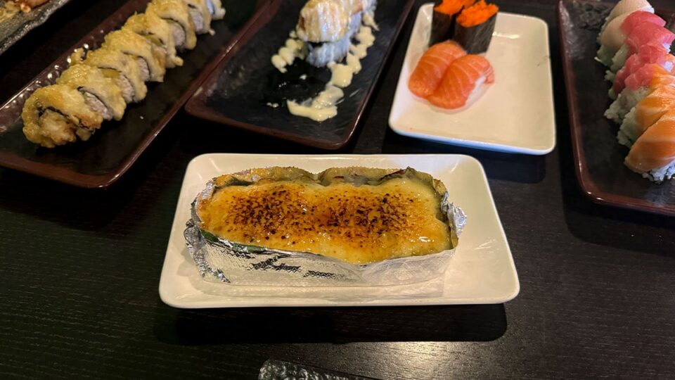 The Japanese lasagna roll at Sasa Sushi topped with creamy baked layers and savory sauce.