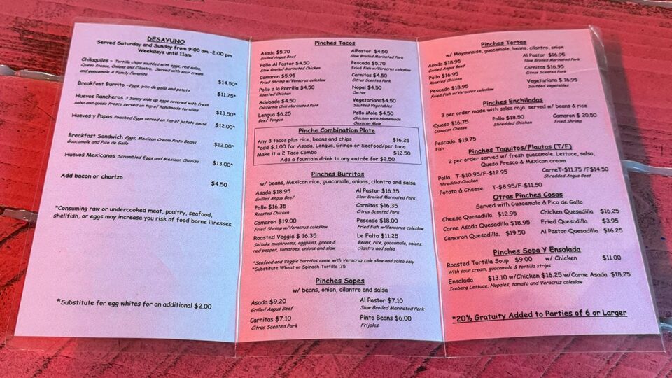 Food menu at Pinches Tacos showing tacos, quesabirria, burritos, and Mexican favorites.
