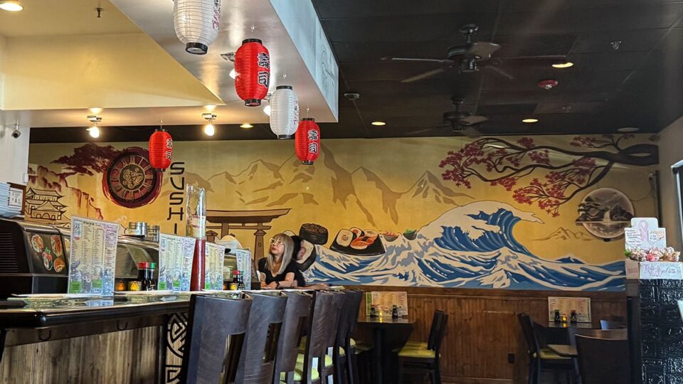Traditional Japanese-inspired wall mural artwork displayed inside Sasa Sushi in Las Vegas.