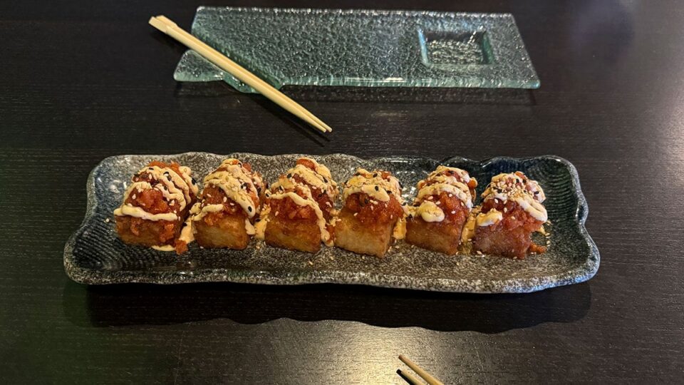 Spicy tuna crispy rice topped with flavorful tuna and crunchy rice squares at Sasa Sushi.