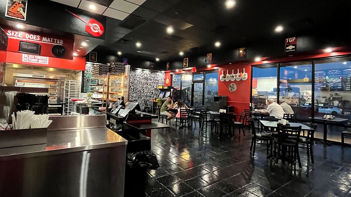 inside view of those guys pies showing the casual dining atmosphere and decor