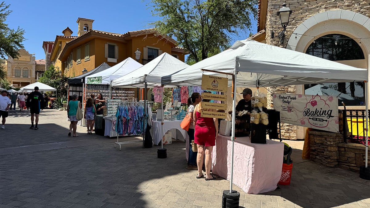 variety of vendor booths lining the pathways at the lake las vegas farmers market