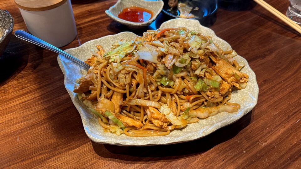 Chicken chow mein with house-made noodles and vegetables at Shang Artisan Noodles.