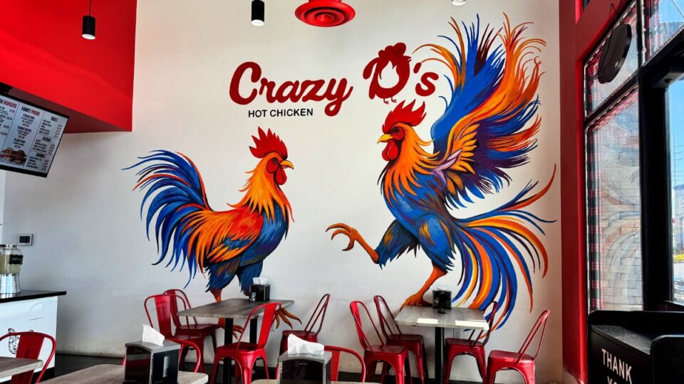 Crazy D’s Hot Chicken restaurant sign displayed