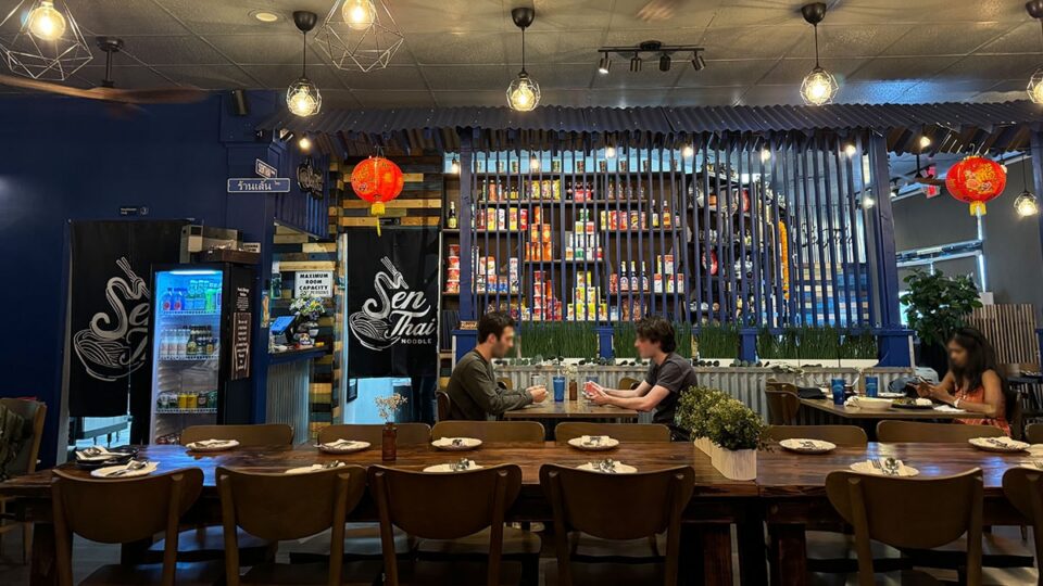 Interior dining room at Sen Thai Noodles with Thai decor and warm ambiance