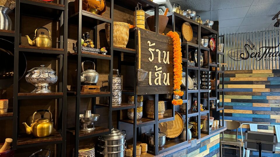 Traditional Thai pots and interior decor displayed inside Sen Thai Noodles