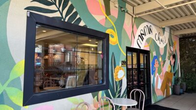 Decorative wall art and colorful interior design elements inside Mama Chai's.
