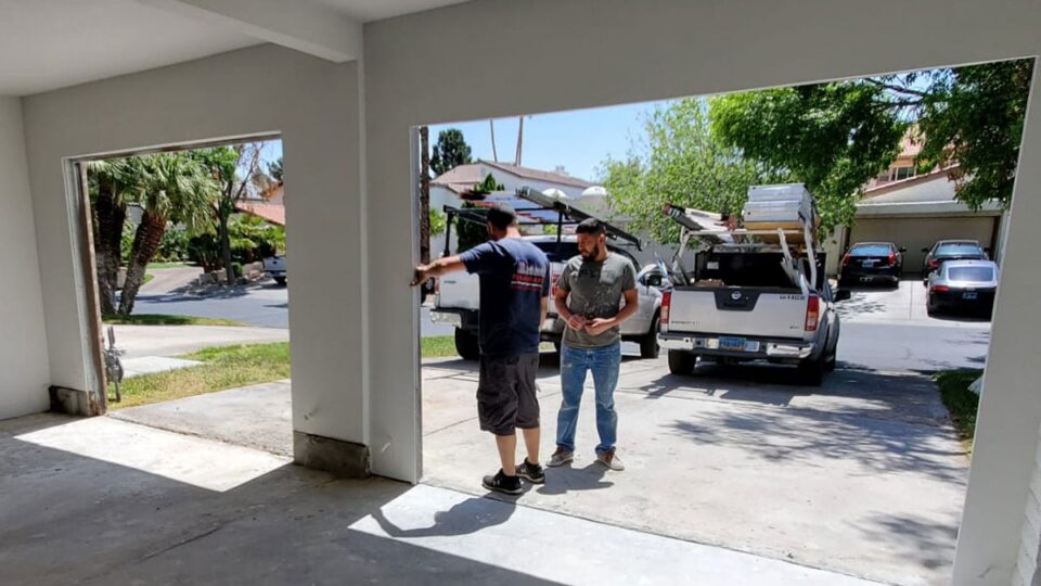 Pacific Experts Measuring for a new Door Installation