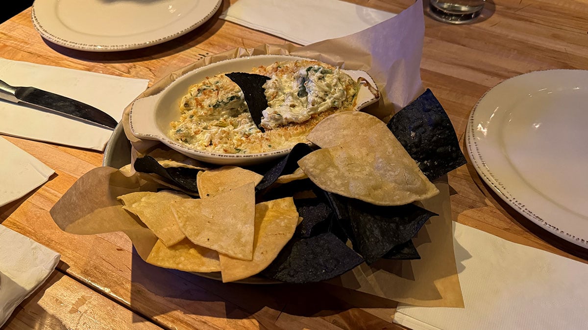 warm spinach dip served with chips for sharing at 90 NINETY Bar + Grill