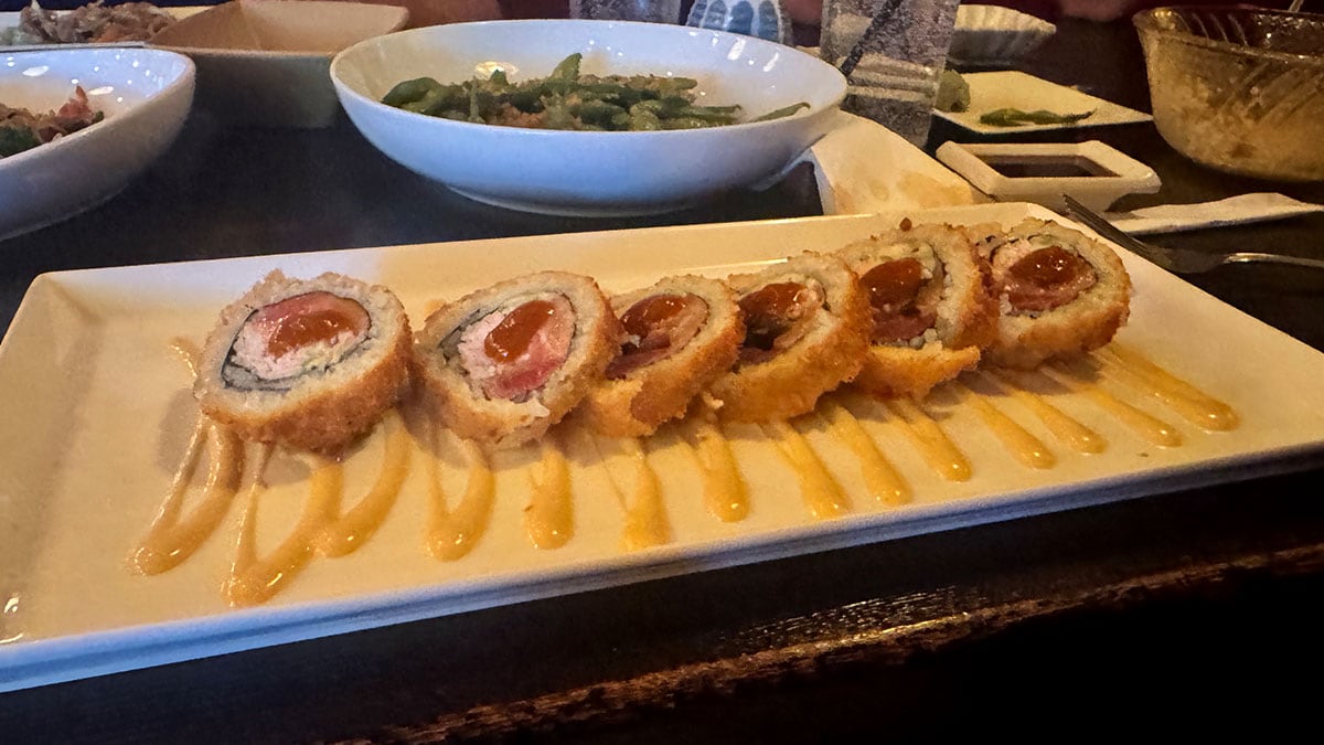 Tempura salmon roll topped and served fresh at Sushi Loca.