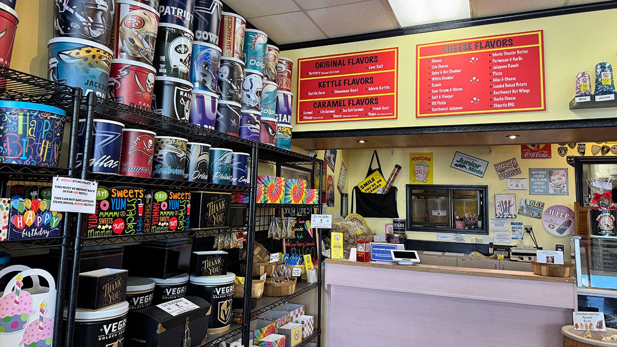 sports-themed popcorn tins and containers featuring popular team designs at Popcorn Girl