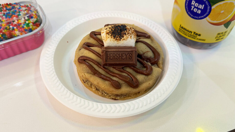 Gourmet s'mores cookie topped with chocolate, toasted marshmallow, and Hershey's chocolate at Cookio Cafe.