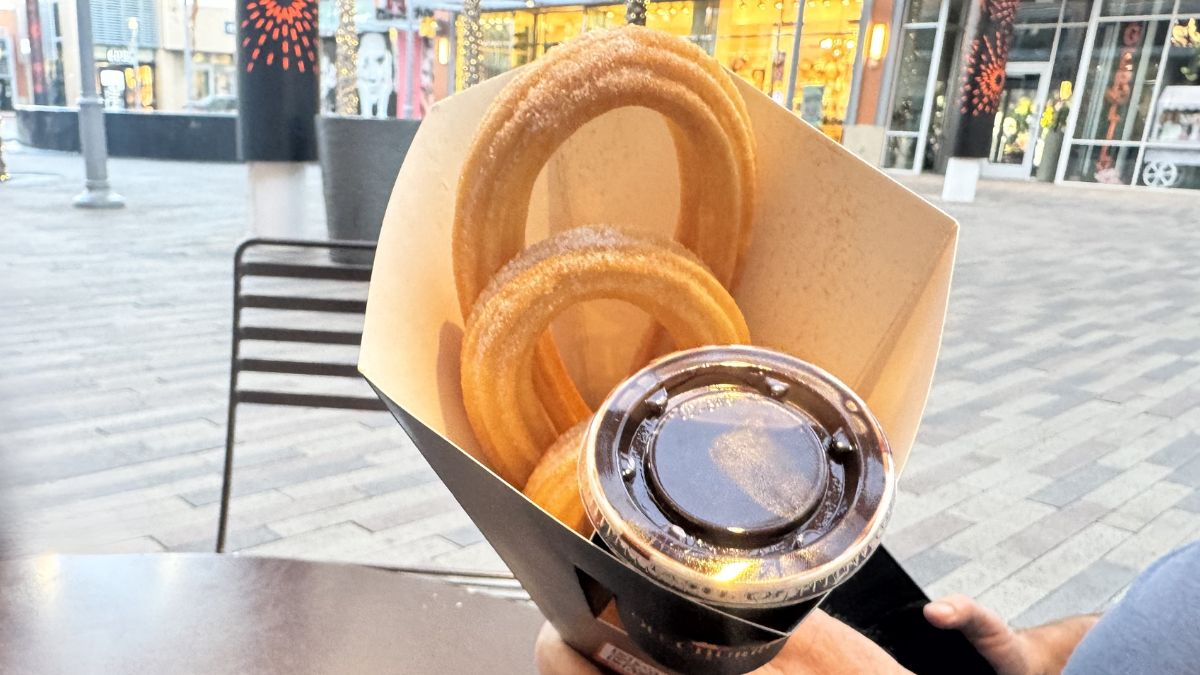 Freshly made Spanish churros served with traditional hot chocolate for dipping.