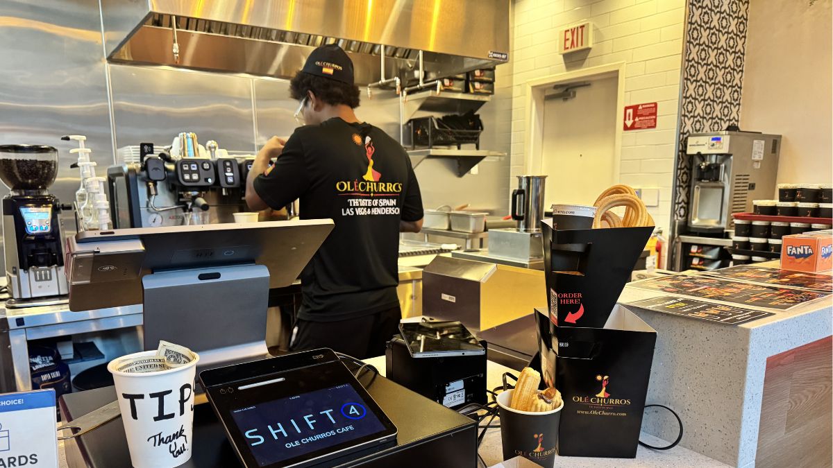 Staff preparing fresh artisan churros at Ole Churros Café in Downtown Summerlin.