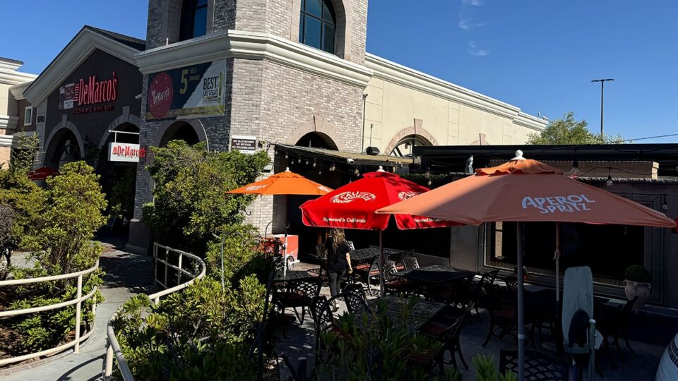 Outdoor patio seating at Dom DeMarco’s Pizzeria & Wine Bar in Las Vegas.