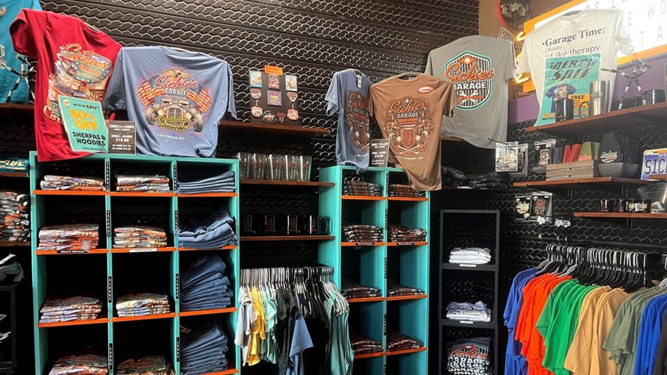Retail area with retro clothing, accessories, and memorabilia inside Sickies Garage