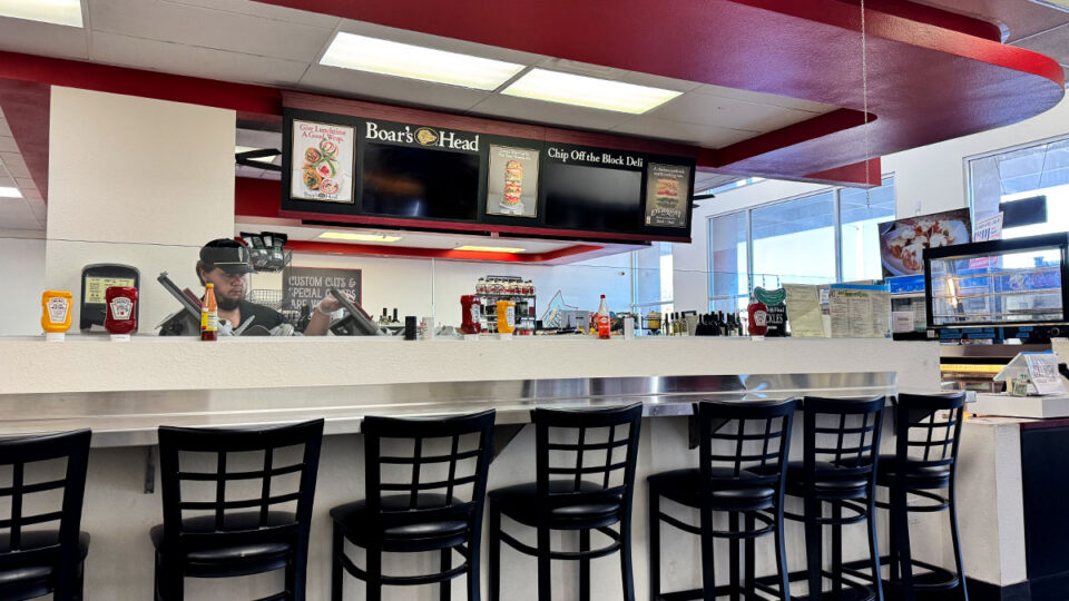 Counter seating with stools inside Chip Off the Block Deli.