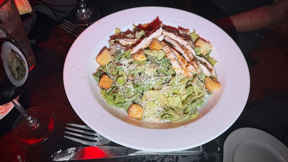 Caesar salad topped with grilled chicken at Capo's Italian Restaurant and Speakeasy in Las Vegas