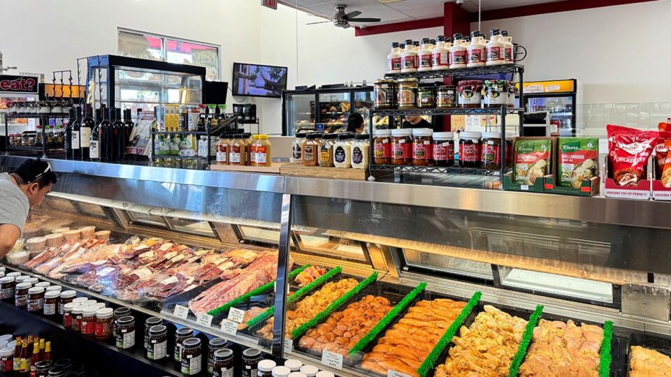 Fresh poultry and meat displayed for sale inside The Butcher Block.