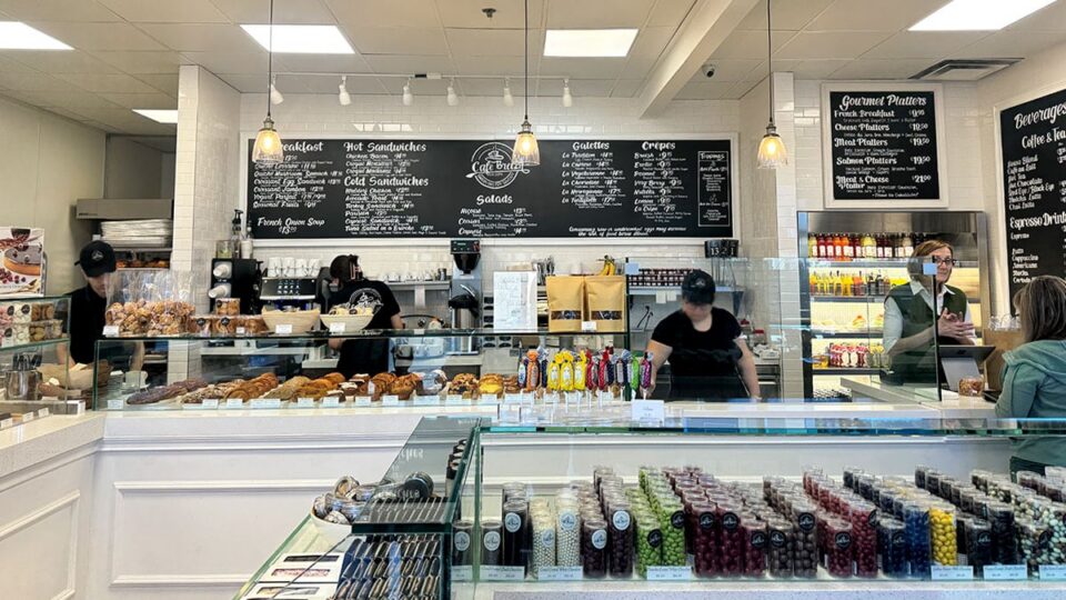The staff and Owner behind the counter