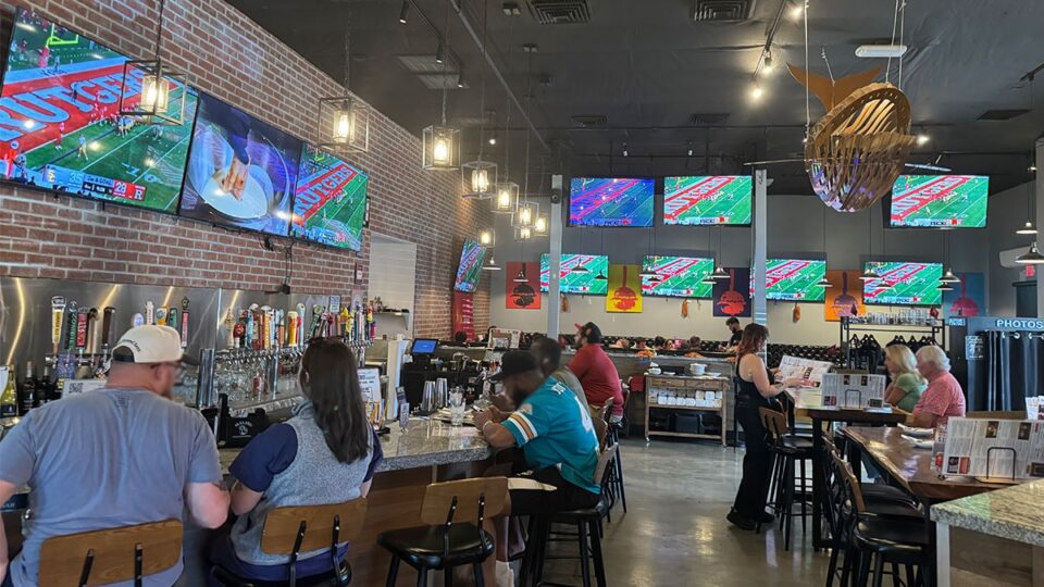 busy full bar area at Slater’s 50/50 on Lake Mead with TVs for watching sports