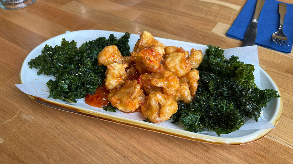 Text: battered Cauliflower Bites with sweet and sour sauce and furikake kale chips at Good Morning Kitchen