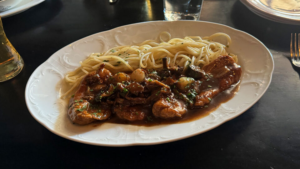 Chicken Marsala with roasted mushrooms and spaghetti at Al Solito Posto