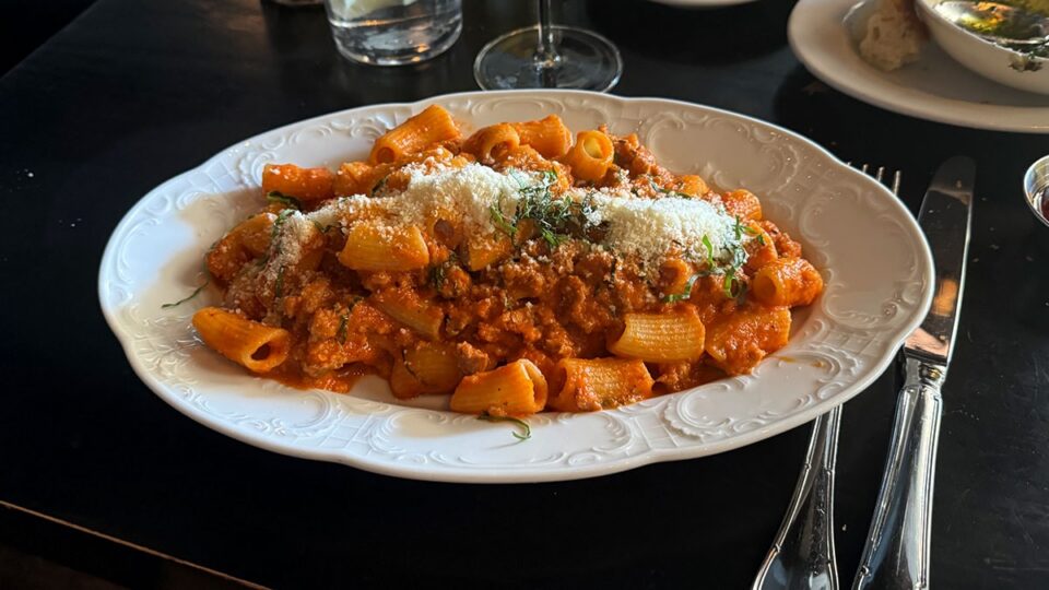 Rigatoni with vodka tomato sauce, basil, and house-made fennel sausage at Al Solito Posto
