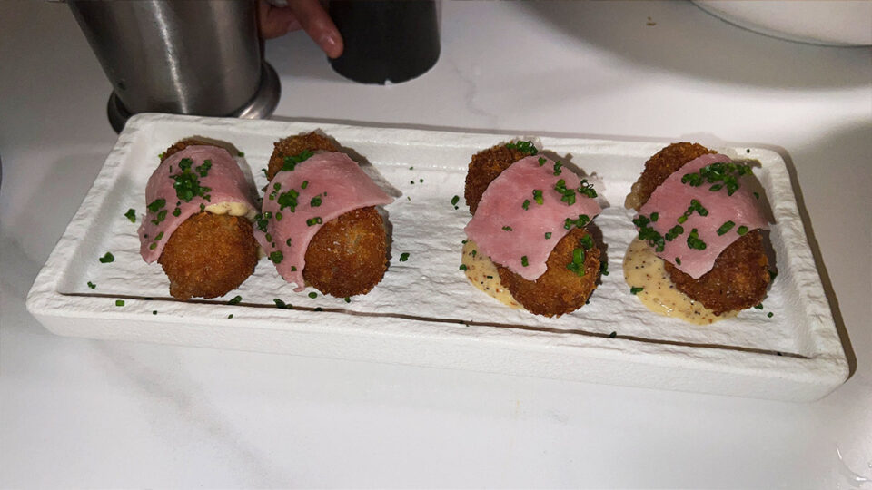Croquetas topped with Parisian ham and chives at Braseria by EDO in Las Vegas
