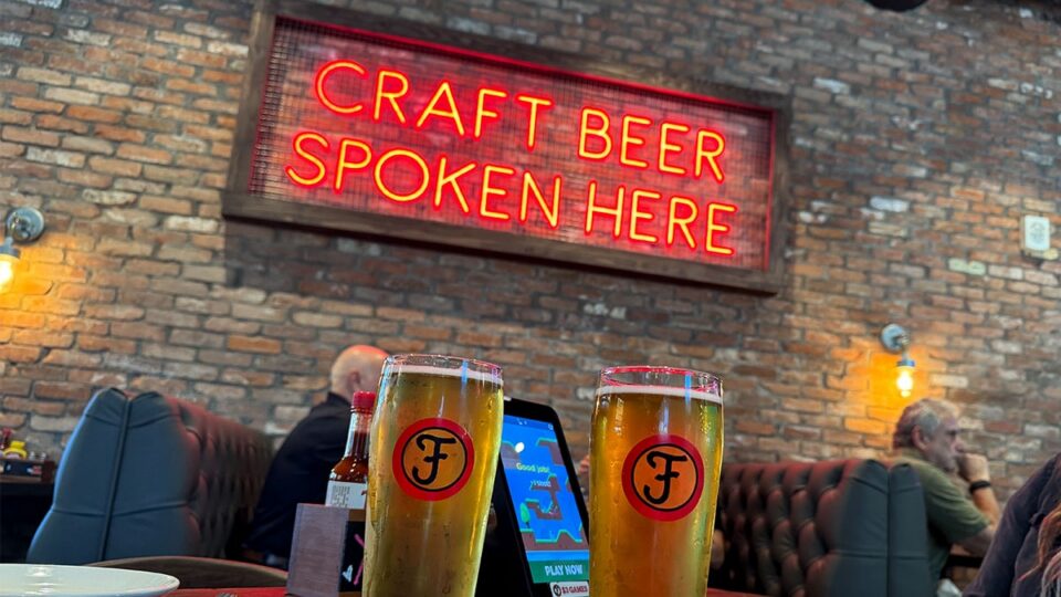 Craft Beer Spoken Here sign inside Finney's Crafthouse in Downtown Summerlin