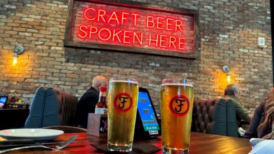 Finney's Crafthouse sign with Craft Beer Spoken Here messaging