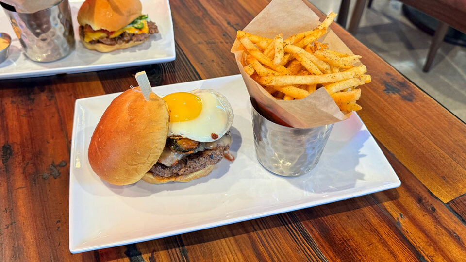 Jalapeño Egg Burger with fried egg, cheddar, bacon and crispy jalapeños at Finney's Crafthouse