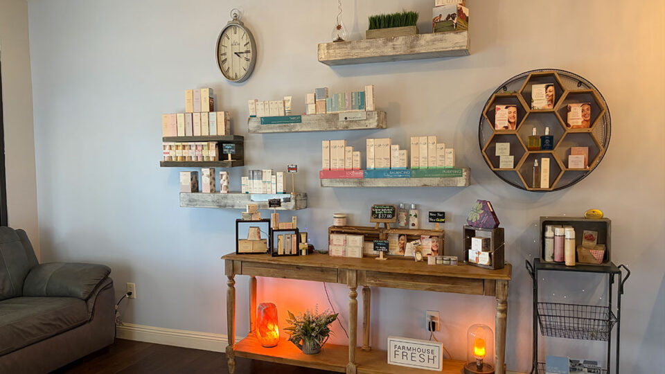 Shelves displaying facial skincare products, FarmHouse Fresh items, and treatment products inside The Spa at Lakeside.